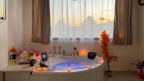 Luxury jacuzzi & pyramids view
